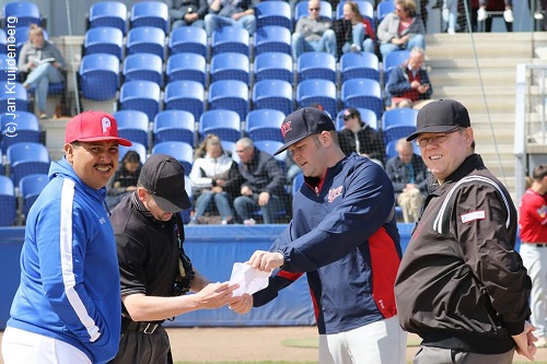 Head Coaches Dè Flanegin and Ty Eriksen exchange line-ups and meet with ...