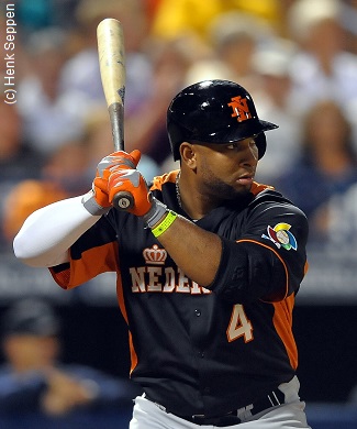 Wladimir Balentien, outfielder of Japanese baseball team Yakult Swallows  holds up a memorial plate after hitting his 56th home run during the ball  game agaisnt the Hanshin Tigers at the Jingu Stadium